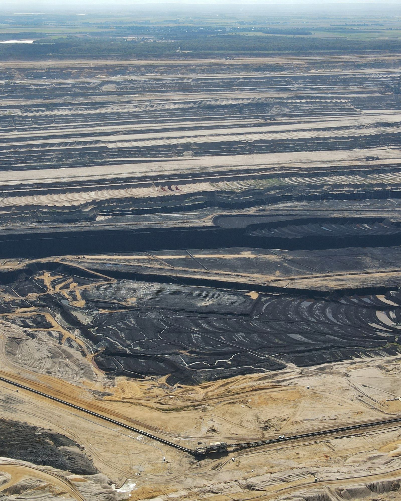Aerial view of a terraced mining operation
